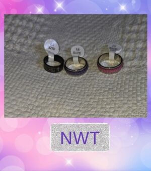 NWT Ring Lot Spanish Writing